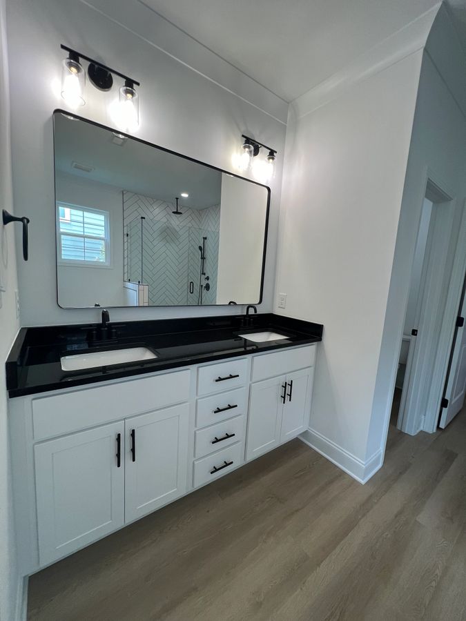 Bright open-concept living and kitchen area in a BKA BUILDERS, Inc. build